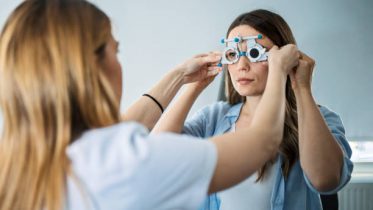 Doctor and patient in ophthalmology clinic